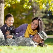 Family playing in the grass