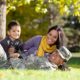 Family playing in the grass